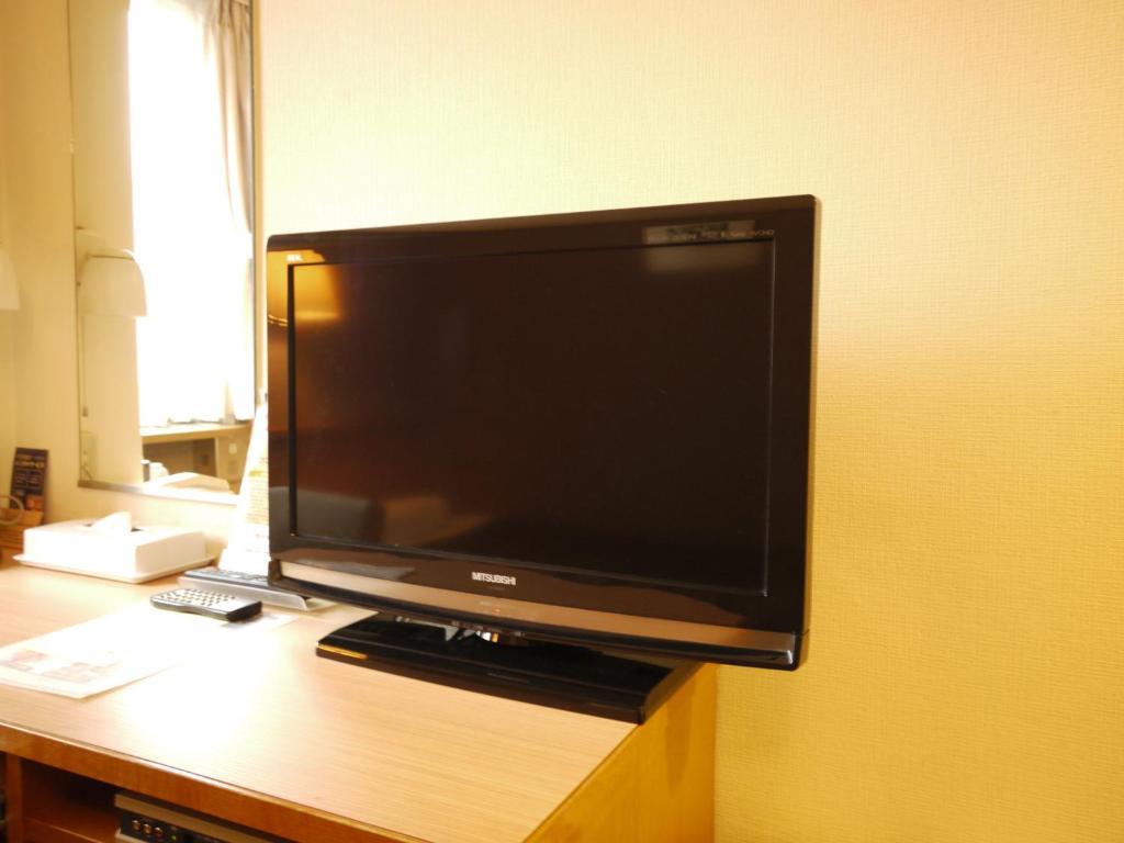 Hotel Route-Inn Hofu Ekimae Habitación foto